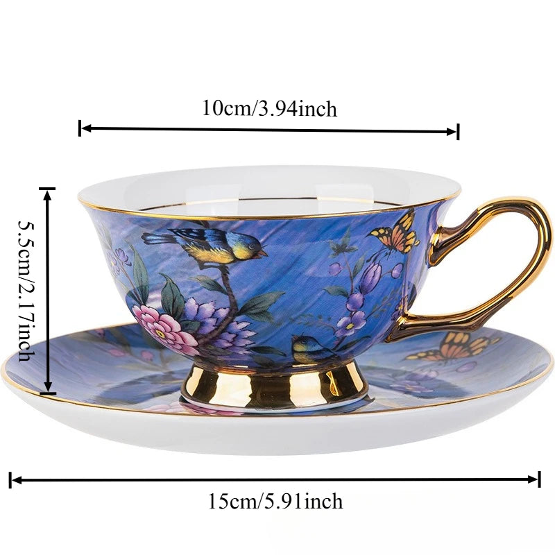 Blue floral teacup and saucer with gold accents, shown with measurements on a white background.