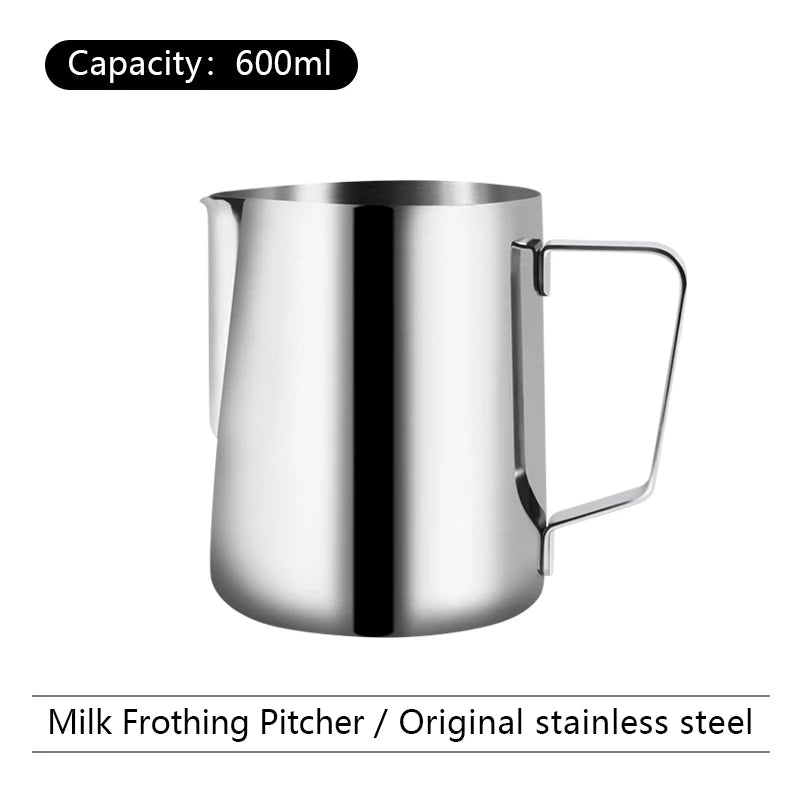 Stainless steel milk frothing pitcher with capacity label on a white background