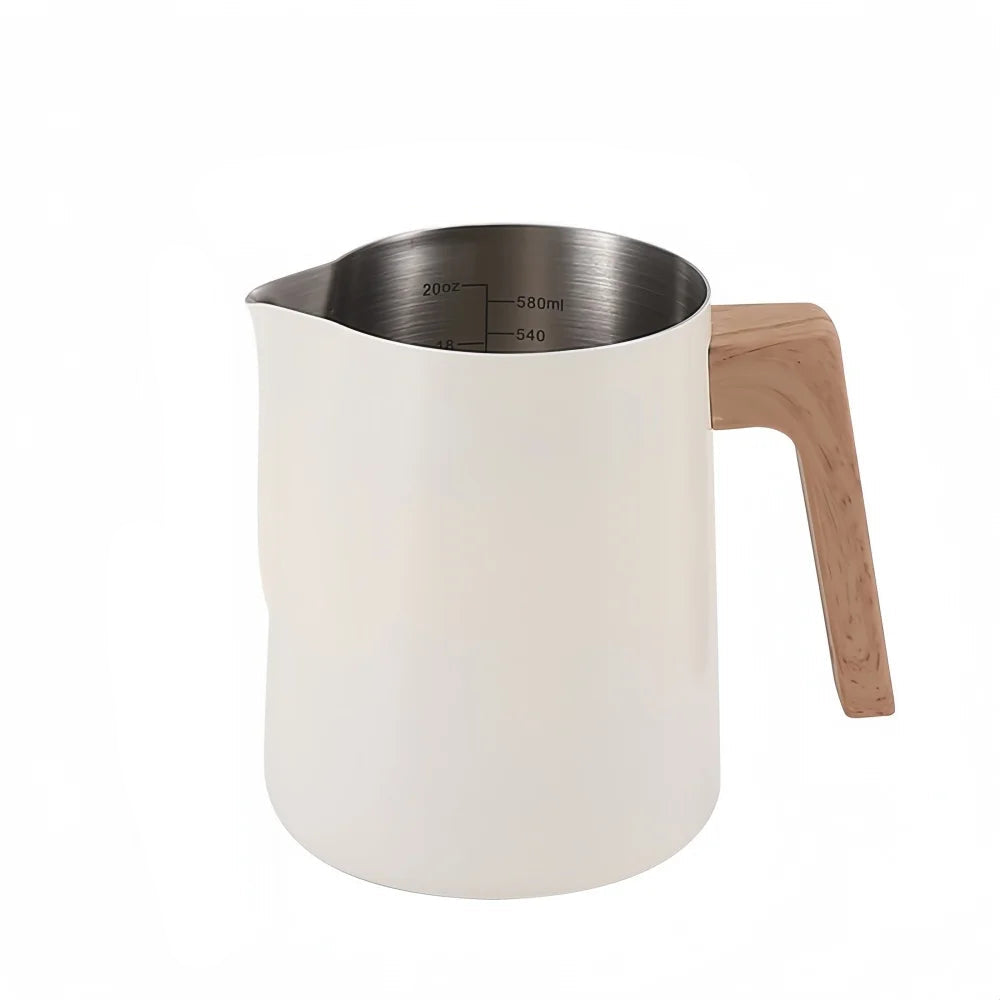 A frosted white milk pitcher with a light wood handle and stainless steel interior