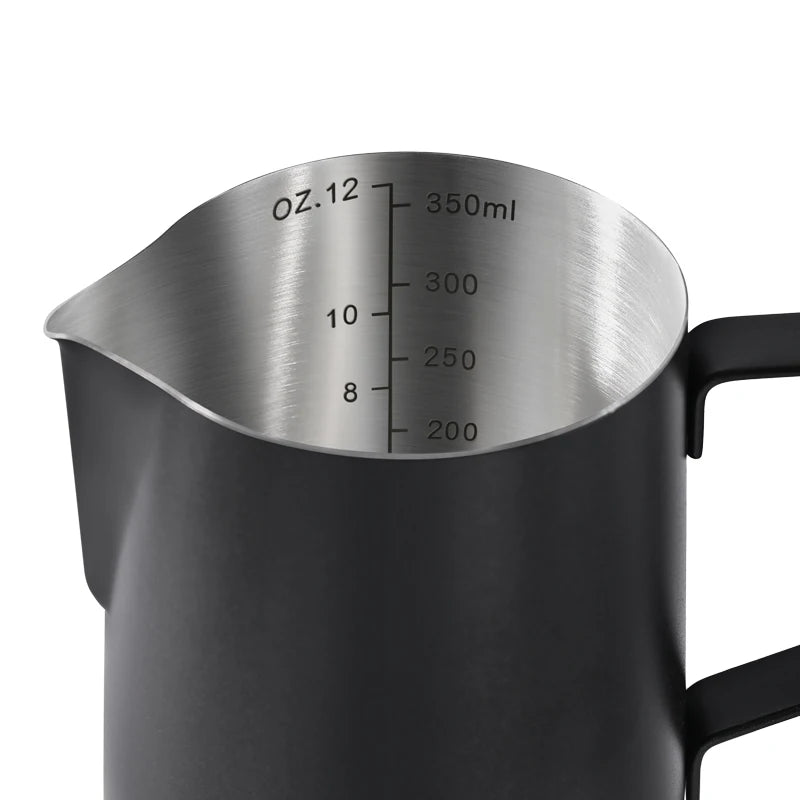 Black milk pitcher with measurement markings on a white background