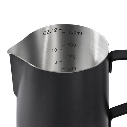 Black milk pitcher with measurement markings on a white background