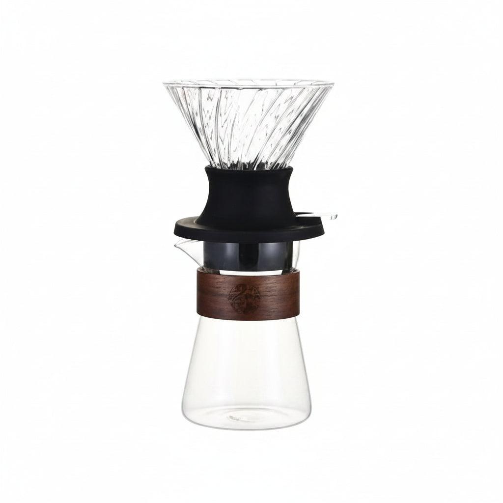 Glass coffee dripper with wooden collar.