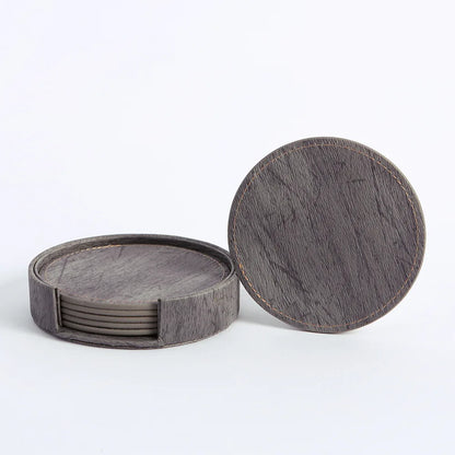 Set of round wooden coasters with a matching storage box on a white background