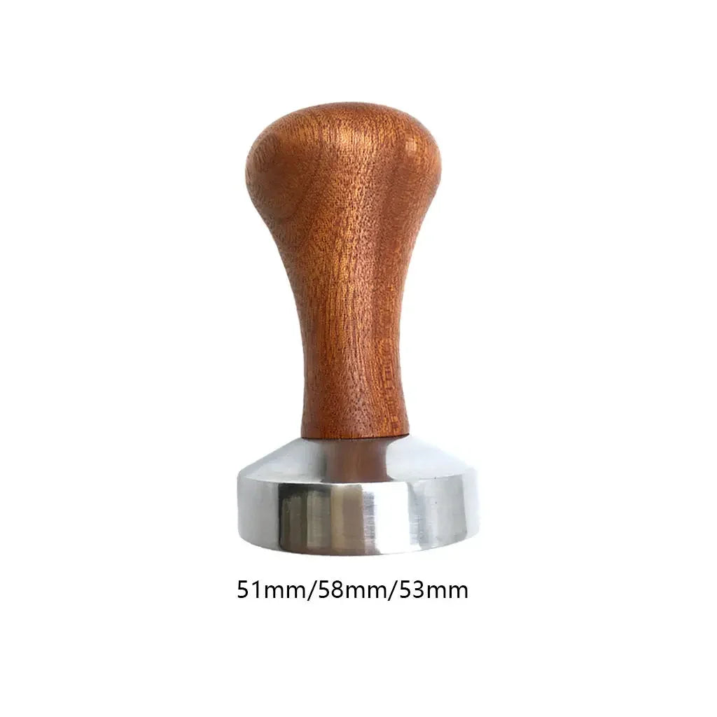 Coffee tamp with wooden handle and metal base on a white background