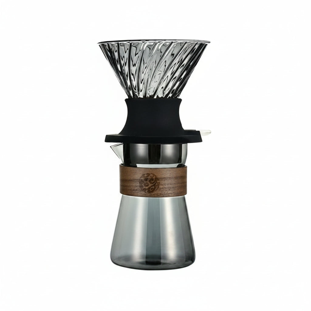 Glass coffee dripper with wooden collar and black silicone sleeve.