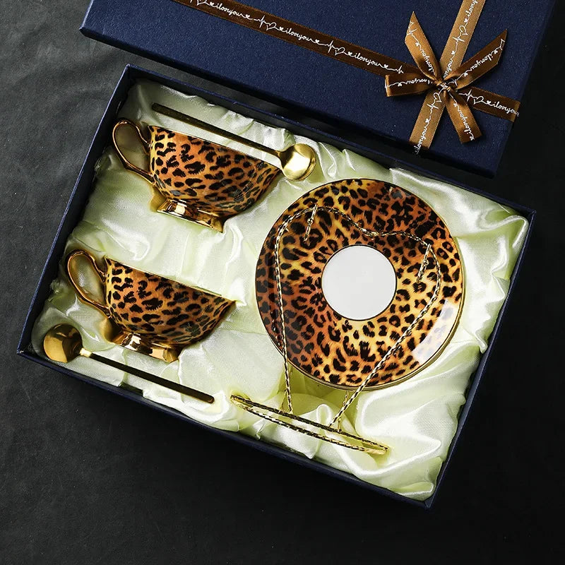Leopard print teacup set with matching tray and spoons in a gift box.