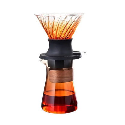 Coffee brewing device with orange glass and wooden accents on a white background