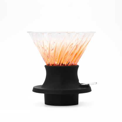 Black and orange tea infuser on a white background