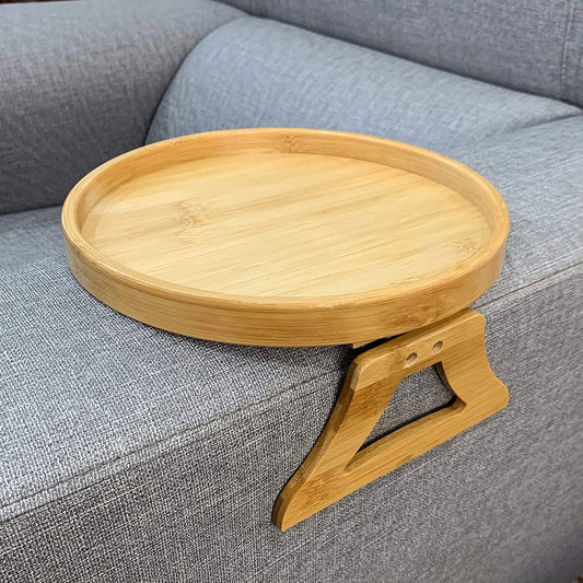 Wooden tray with stand on a gray sofa