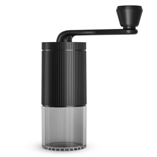 Black and clear manual coffee grinder on a white background