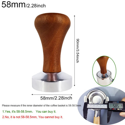 Wooden handle coffee tamp with measurements on a white background