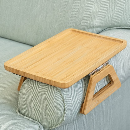 Wooden tray on a light green sofa