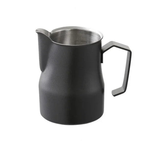 A matte black metal milk pitcher with a stainless steel interior and a curved handle, shown on a plain white background.