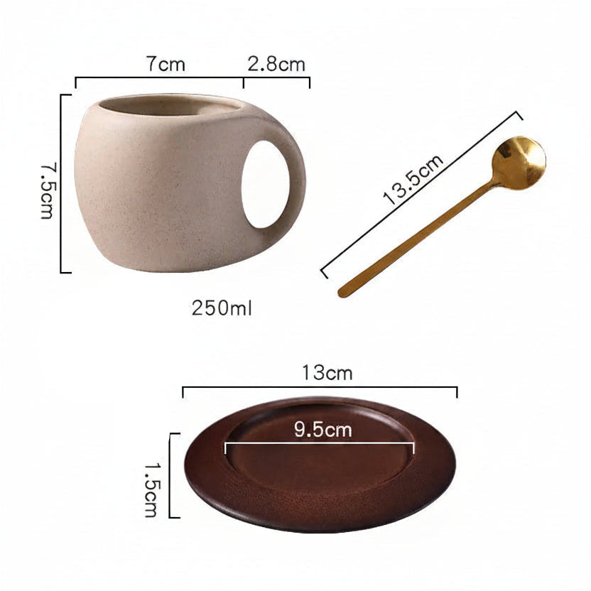 Measurement chart of a ceramic mug, gold spoon, and brown plate on a white background