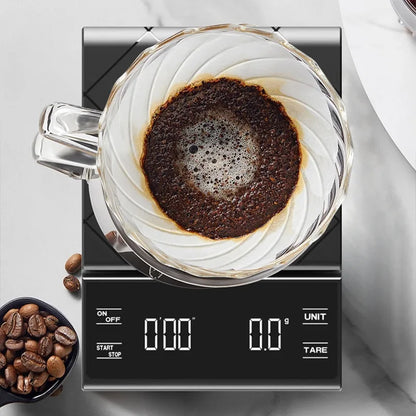 Digital kitchen scale with a glass container of coffee grounds on a light gray background