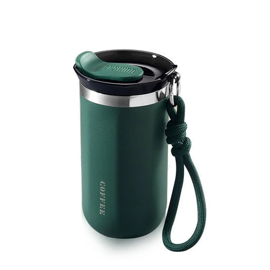 Green thermos mug with a handle on a white background