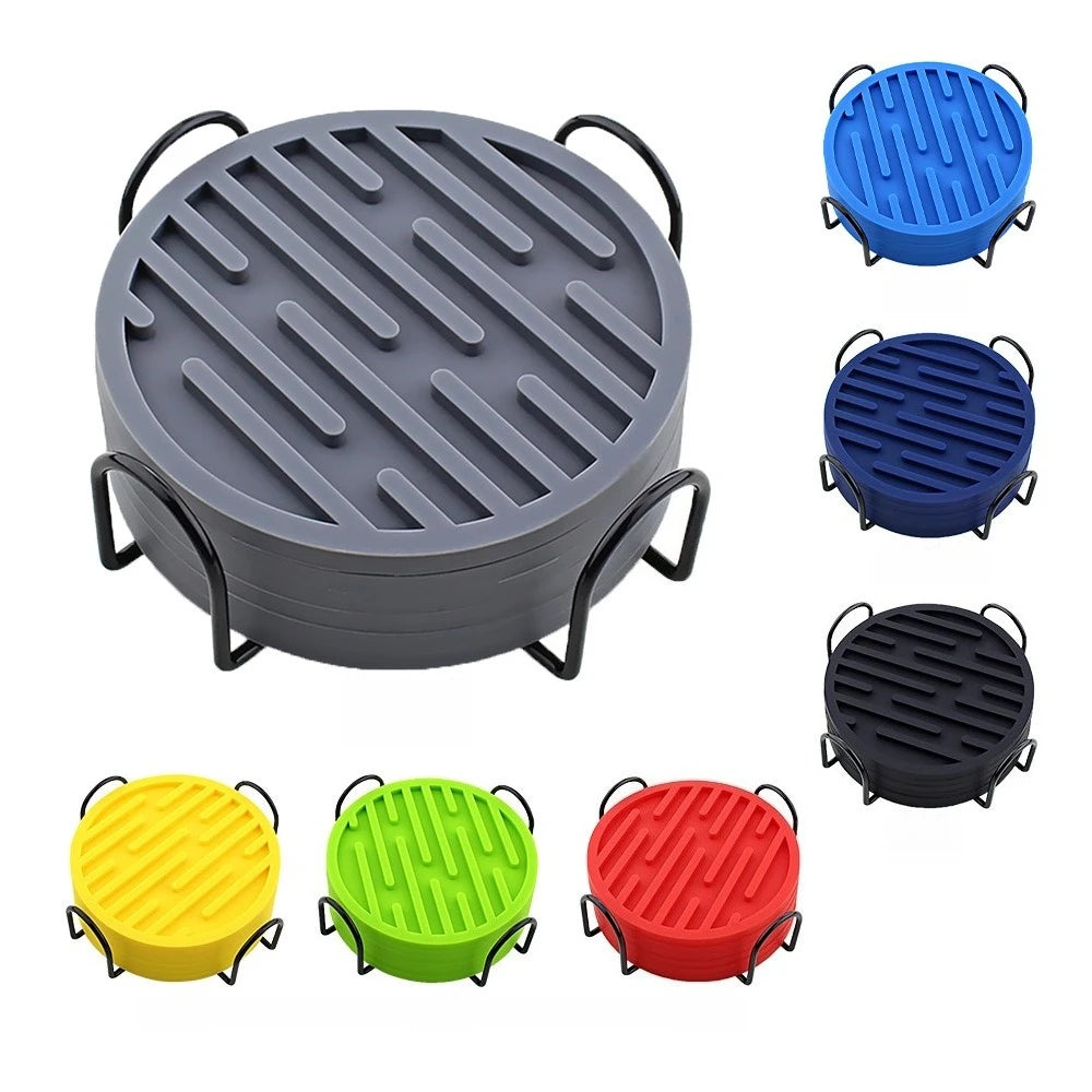 Round coasters with black metal stand in gray color, surrounded by other colored versions on a white background.
