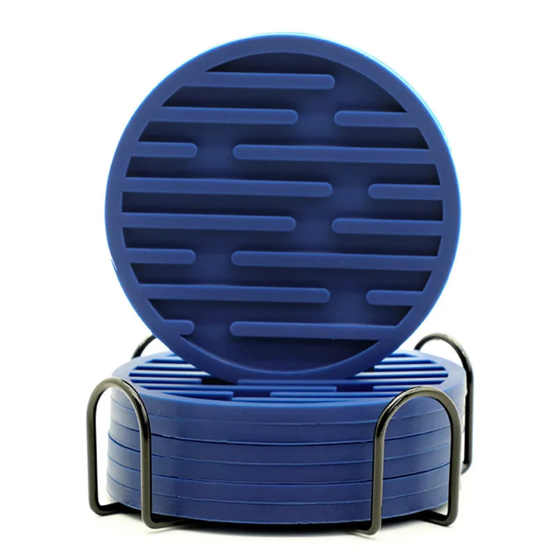 Blue silicone coasters with black metal stand on a white background