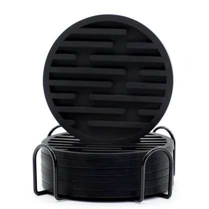 Black silicone coasters with black metal stand on a white background