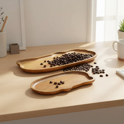 Two wooden trays with wavy edges on a white background