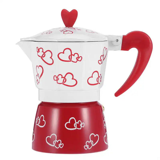 Red and white teapot with heart patterns on a white background