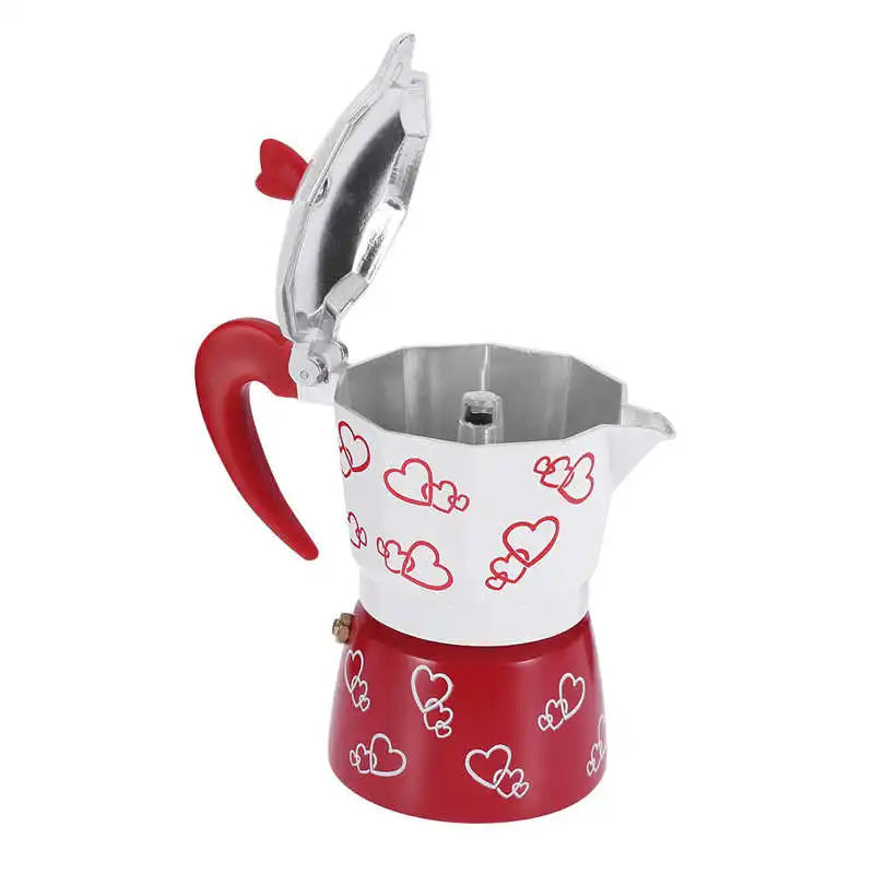 Red and white coffee maker with heart patterns on a white background