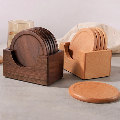 Wooden coasters in holders on a light surface