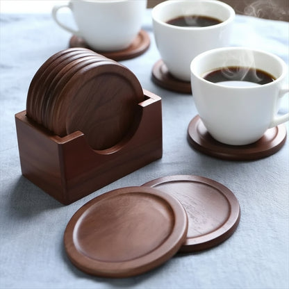 Wooden coasters with a holder on a table with coffee cups